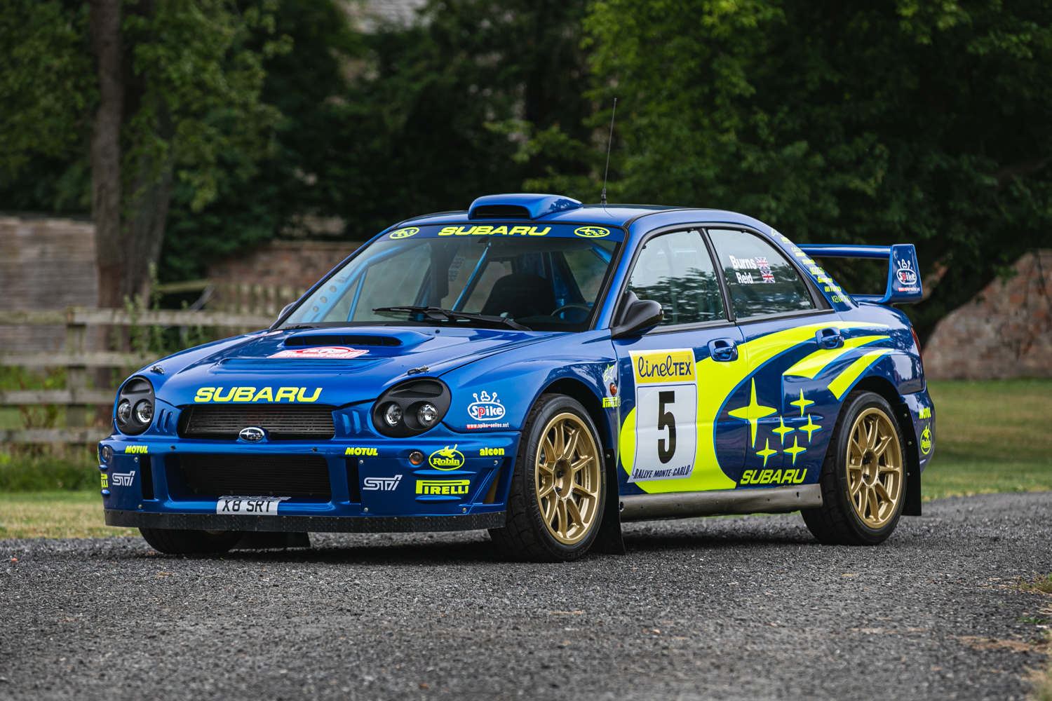 Three notable race and rally cars from 1959 to 2001 lead...