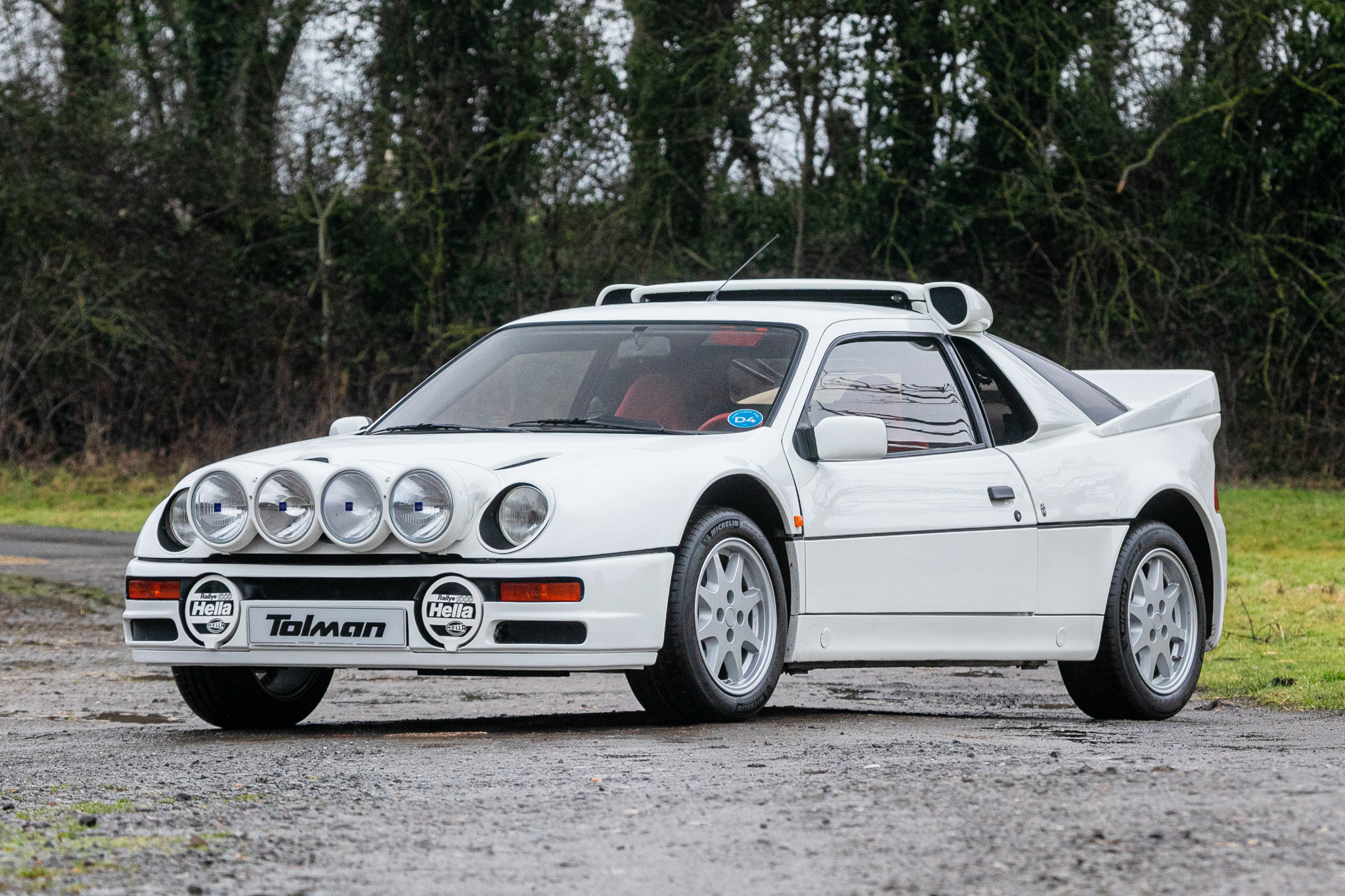 1986 Ford RS200 S - 1,404 Miles. Sold for £305,000 Image Honda Dax monkey Bike
