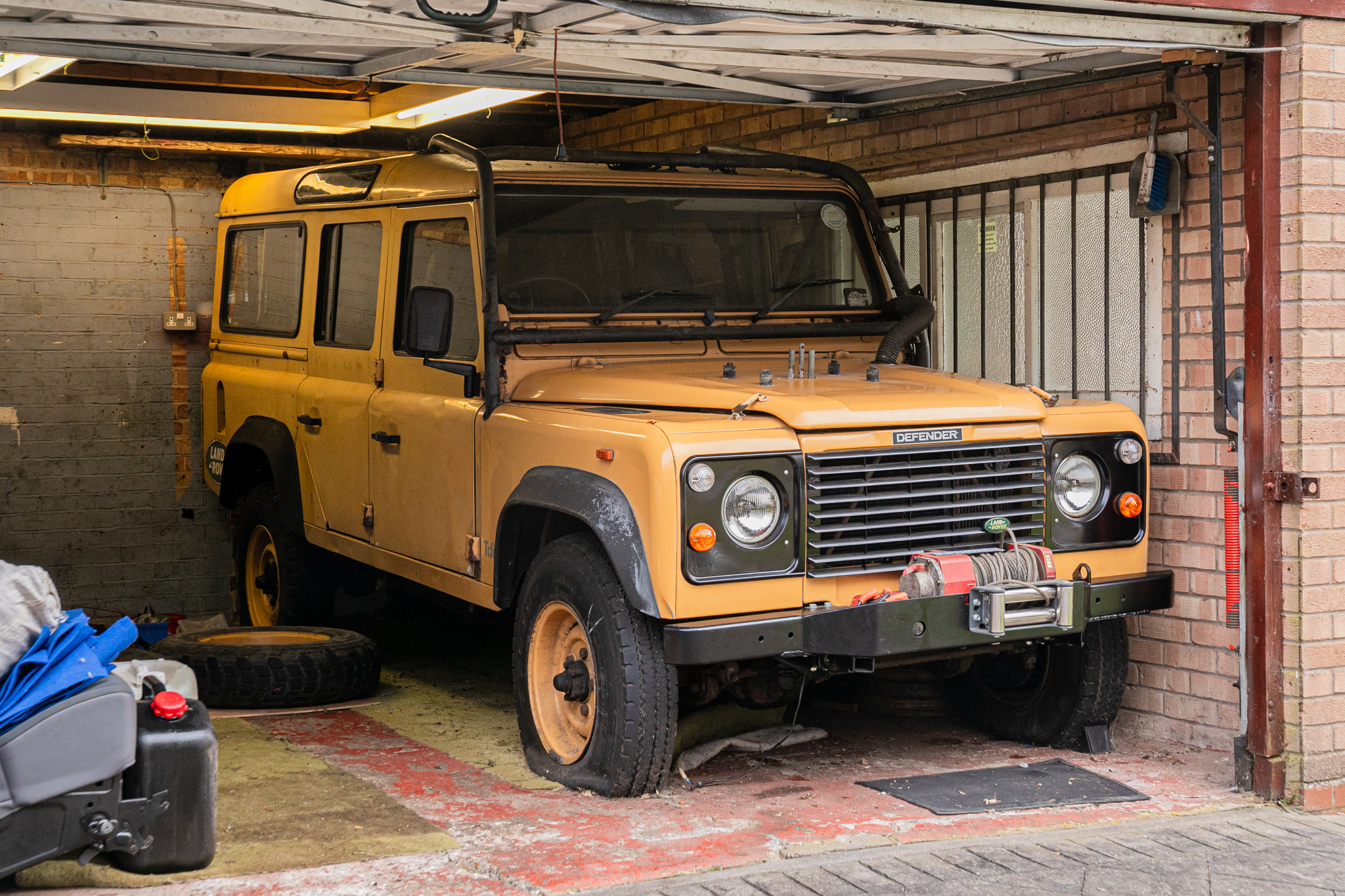 1992 Land Rover Defender 110 200Tdi SW - ex-Camel Trophy 1993 Estimate: £15,000 -£20,000 Image Camel Land Rover in garage